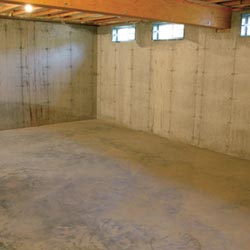 A cleaned out basement in Fairfield, shown before remodeling has begun