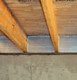 SilverGlo insulation installed in a floor joist in Mount Vernon