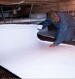Wethersfield insulation being installed in a crawl space.