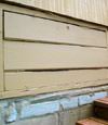 an old-fashioned crawl space door in Danbury about to be replaced