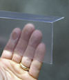 Closeup of a clear plastic covering on a Hartford crawl space block wall