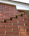 Serious damage to a foundation wall due to settlement of a home in Simsbury