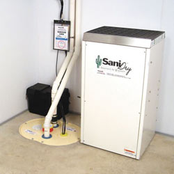 Sump pump system, dehumidifier, and basement wall panels installed during a sump pump installation in Torrington