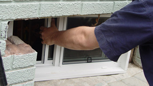 Installing new windows in a Greenwich finished basement
