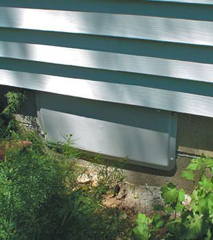 A gray crawl space vent cover in Southington