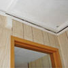 The ceiling and wall separating as the wall sinks with the slab floor in a Danbury home