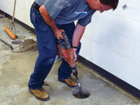 Coring the concrete of a concrete slab floor in Glastonbury