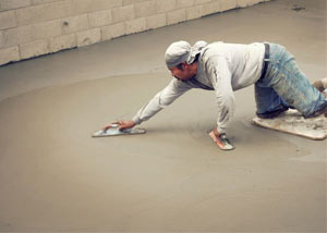 smoothing out the grout in a slab releveling project in Poughkeepsie