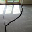 a huge crack in a concrete slab floor in West Hartford
