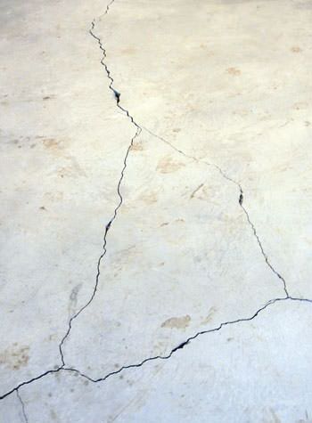 severely cracked, heaving slab floors in a home in North Haven