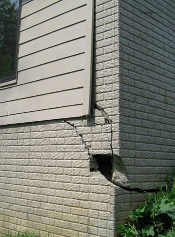 severe cracking of structural walls in Darien