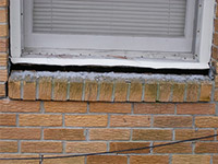A window sill cracking and separating from the foundation wall in a West Haven home.
