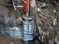 Foundation repair contractors lifting a structure in Norwalk.
