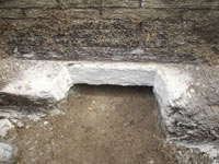 Preparing a foundation footing for helical pier installation in Hamden