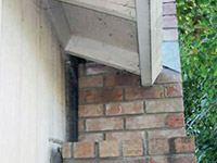 A chimney leaning away from the home on a Watertown foundation