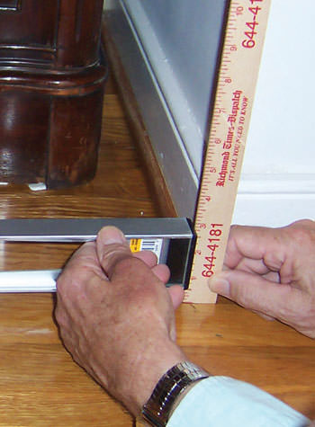 sinking, uneven floors above a sagging crawl space in New Milford