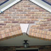 Major tuckpointing on a home archway over a door, with tuckpointing several inches wide that has failed on a Stamford home