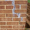 Tuckpointing that cracked due to foundation settlement of a Norwalk home