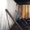 Temporary foundation wall supports stabilizing a Fairfield home