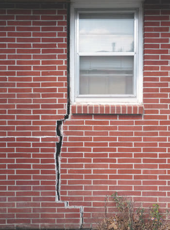 severe foundation wall cracks along a window in South Windsor