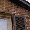 Stair step cracking starting at a window in a Guilford home