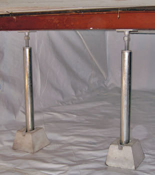 Crawl space jack posts installed in conjunction with a crawl space vapor barrier in Avon