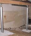 A system of crawl space support posts adding structural support to a crawl space in Westport