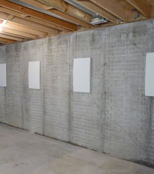 Wall anchor covers covering a foundation wall repair system in New Canaan, Wilton, Glastonbury, Simsbury, Shelton
