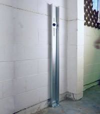 A failing foundation wall repaired with a foundation wall channel anchor system in a Fairfield home.