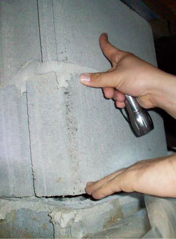 a completely failing concrete crawl space support pillar in Westport