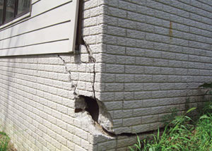 A severely damaged foundation wall in Trumbull