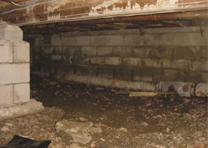 Rotting, decaying crawl space wood damaged over time in North Haven