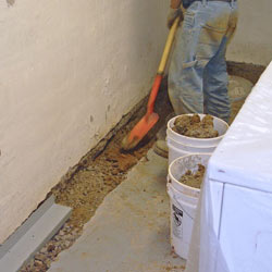 Digging a trench for a French Drain system in Stamford