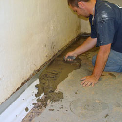 Testing a French drain system in a New Canaan home.