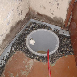 Installing a sump in a sump pump liner in a West Hartford home