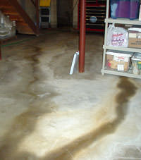 Flooding entering a basement through a floor crack in Meriden