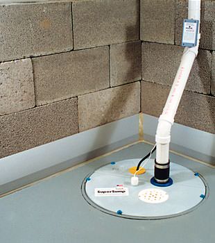 A baseboard basement drain pipe system installed in New Canaan