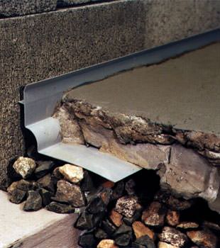 a custom designed basement drain system for thin basement floors in South Windsor.