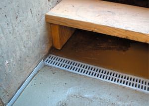a hatchway entrance in Meriden that has been protected from flooding by our TrenchDrain basement drainage system.