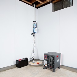 Sump pump system, dehumidifier, and basement wall panels installed during a sump pump installation in Simsbury